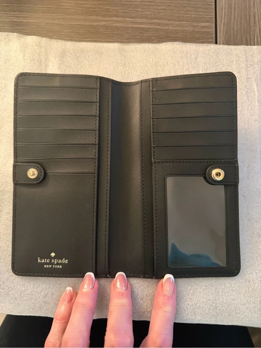 kate spade Black Leather Slim Wallet with Gold Logo. Excellent condition